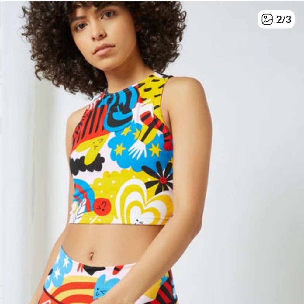 Adidas GV3369 Sportswear Egle Crop
Graphic Tank